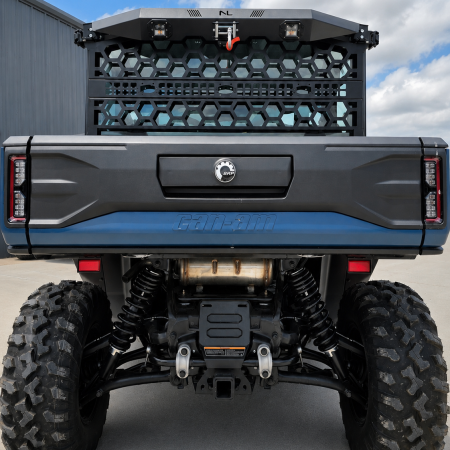Rear view of Can-Am Defender HD11 with No Limit Wheels Headache Rack and Game Loader installed